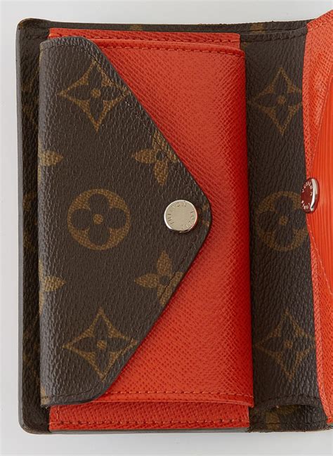 louis vuitton canvas vs leather wallet